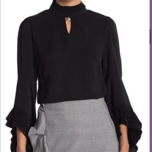 Medium black flouncy-sleeved Gracia blouse with front cutout